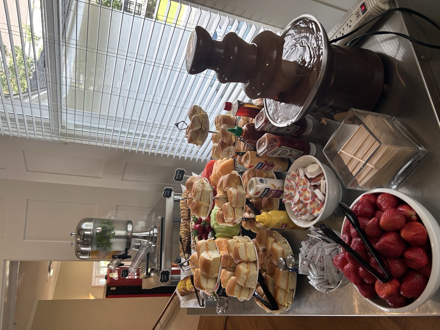 Brunch spread with pastries and fruit